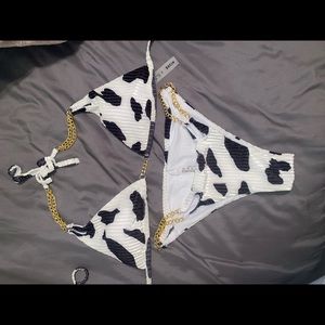 Cow print swim suit size medium